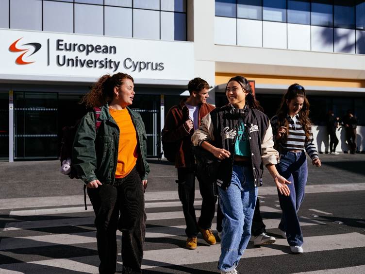 A group of people walking in front of a building

AI-generated content may be incorrect.